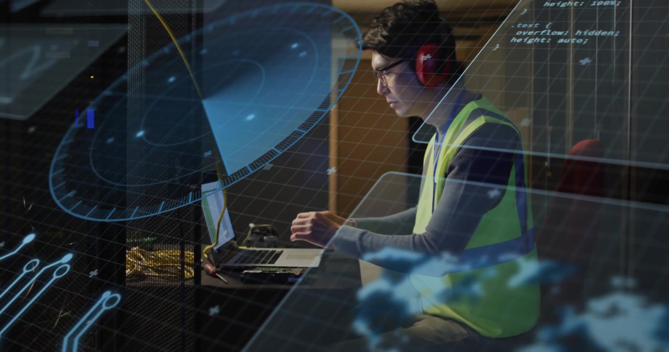 IT specialist watching holographic panels shift in control, then typing commands adjusting systems