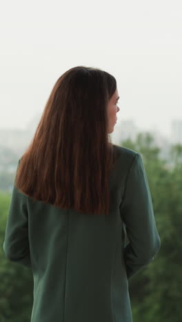 distressed woman stands on roof at rain. businessperson tired of failures in commercial activity thinks about life ending. financial crash of company