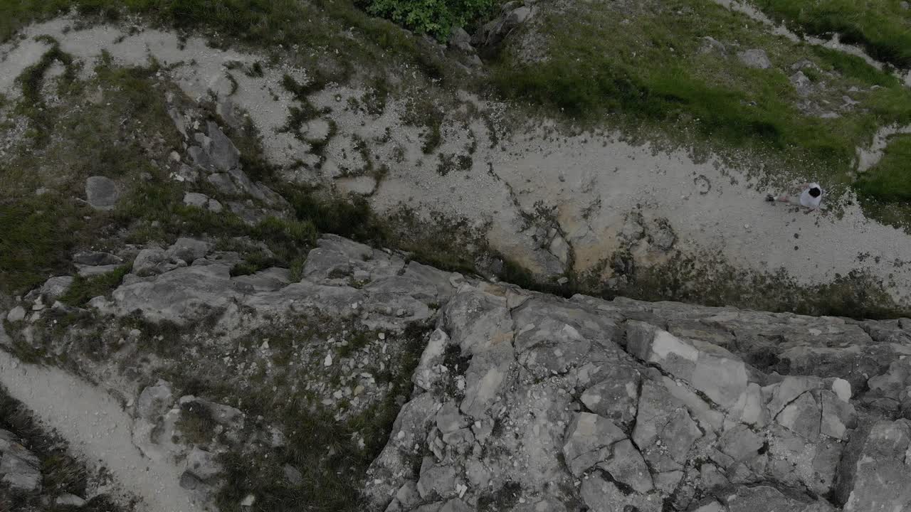 Aerial View of Person Hiking on Rocky Trail