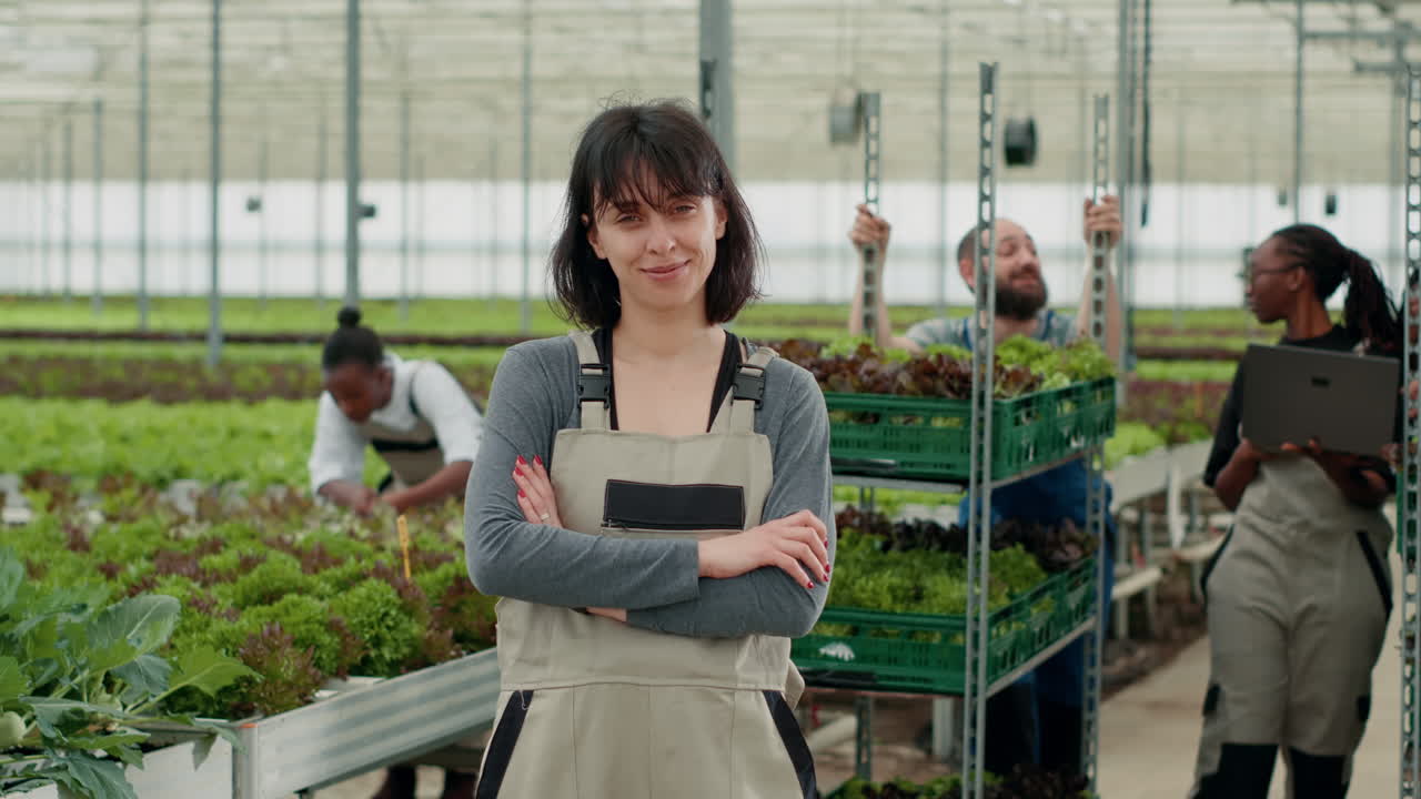 People working in a greenhouse farm