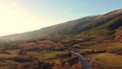 Areal-view-of-a-road-passing-next-to-the-Balkan-mountains-in-Bulgaria