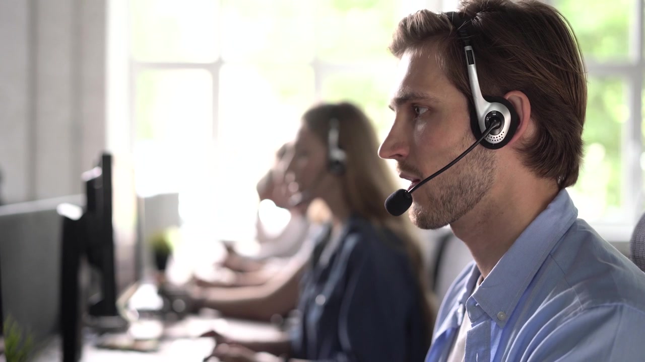 Customer Service Representative Working in a Busy Call Center