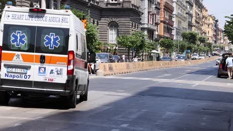 ambulance navigating busy naples intersection