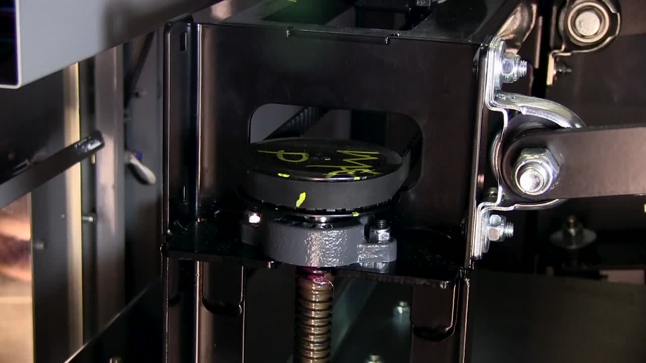 Finger Pointing On Part Of Automatic Paint Mixer