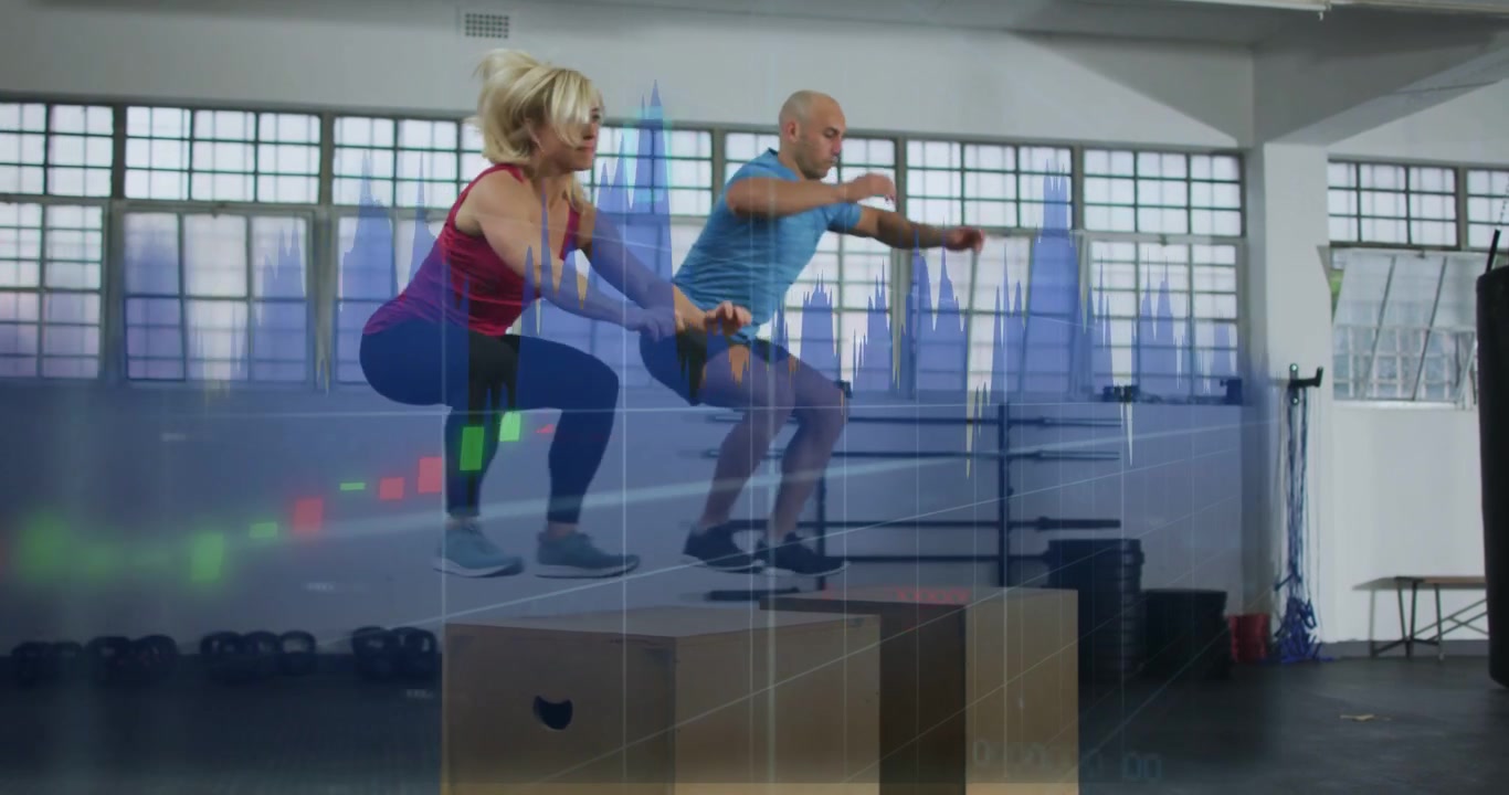 Vertical video: Pair squatting then launching box jumps for fitness, faint chart moving over frame
