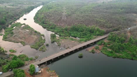 ambeshiv kh badlapur, maharashtra barvi river drone shot sunny day bridge