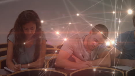 animation of students sitting by desks over a web of connections, data processing in the background.