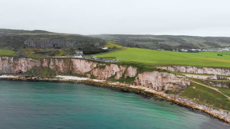 Aerial-footage-of-the-Northern-Irish-coast-by-the-Carrick-a-rede-rope-bridge