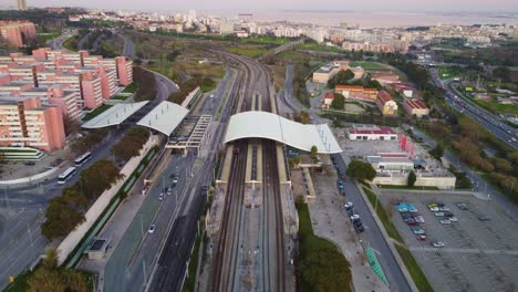 drone shot flying forward above a train track