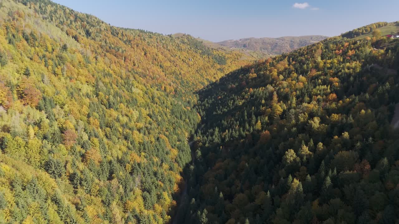Drone shot of Fagaras Mountains nearby in spring, Romania