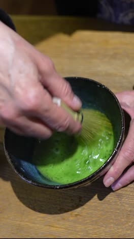 preparing matcha green tea