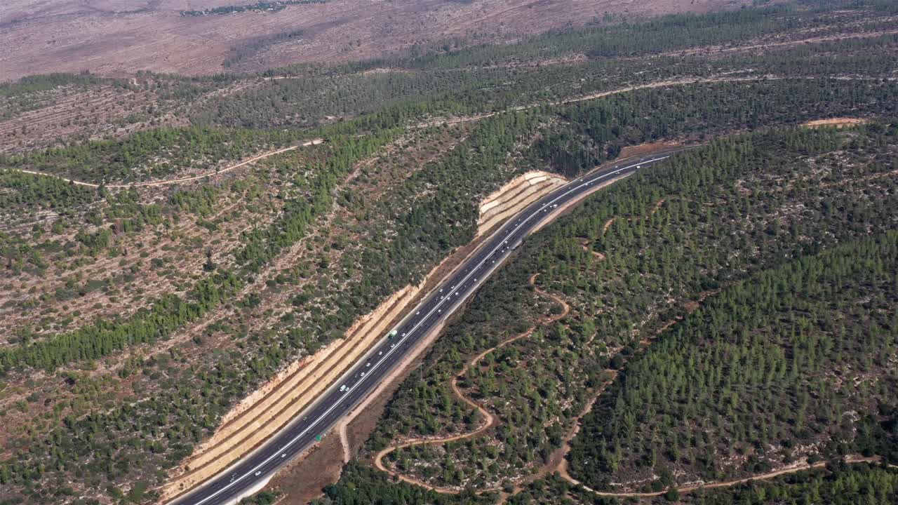 Highway Winding Through Mountainous Landscape