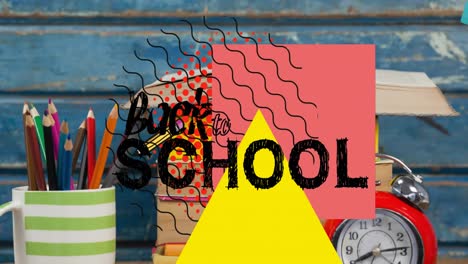 Animation-of-back-to-school-text-over-school-items