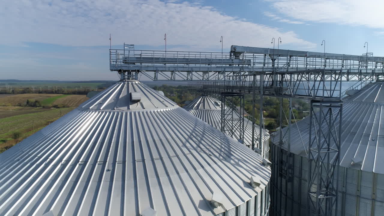Huge industrial metal containers. Big factory metal constructions. Aerial view.