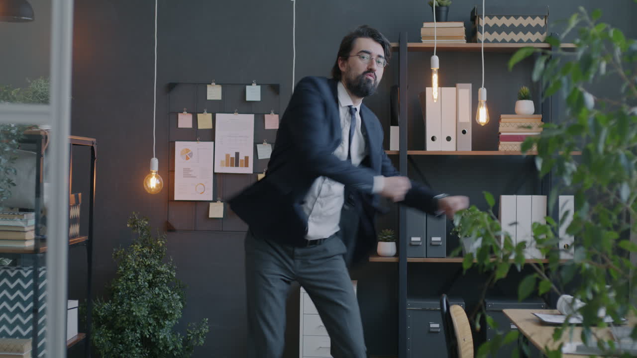 Businessman Dancing in Office