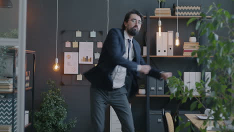 businessman dancing in office