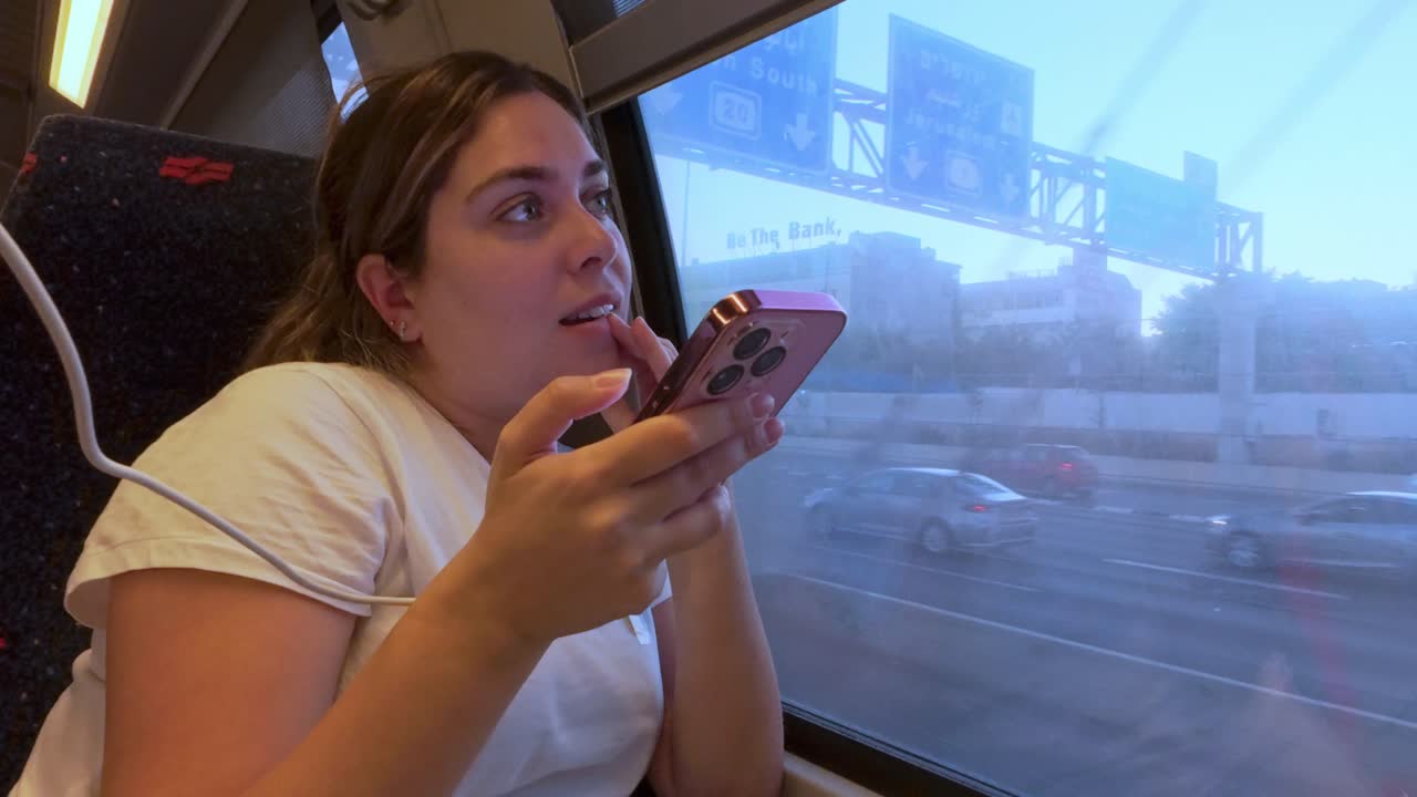Young Woman in a Pensive Mood While Traveling by Train