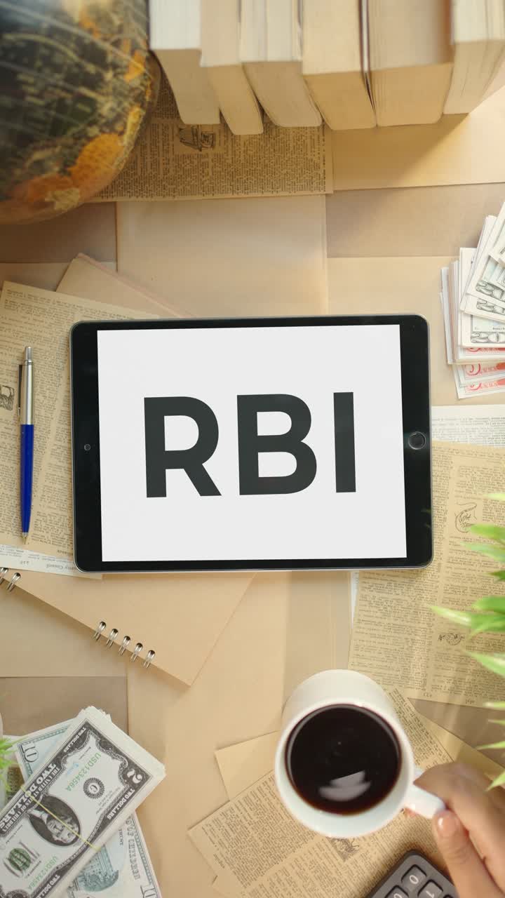 VERTICAL VIDEO OF RBI DISPLAYING ON FINANCE TABLET SCREEN