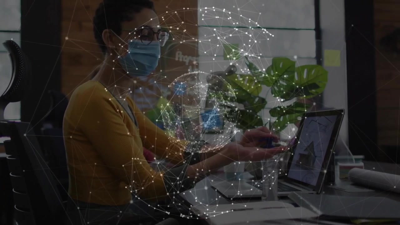 Businesswoman typing reaching for pump sanitizing hands returning to laptop globe overlay tracking