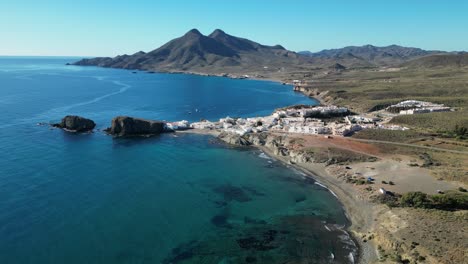 Cabo-de-Gata-coastline-and-Isleta-del-Moro-in-Almeria,-Andalusia,-Spain---Aerial-4k