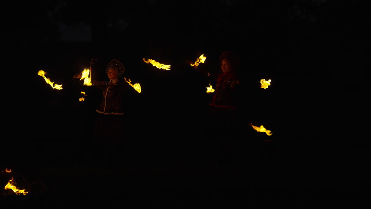 Children Fire Jugglers at Night