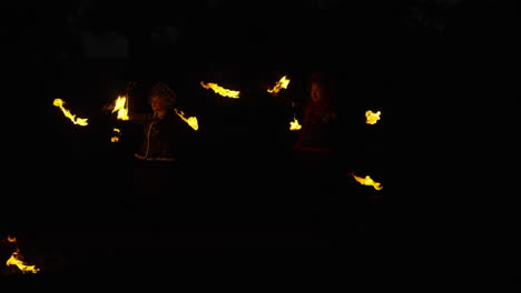 children fire jugglers at night