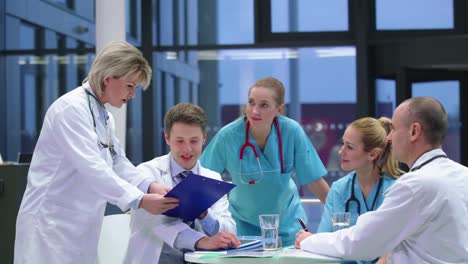 team of doctors having a meeting in conference room