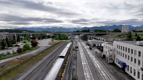 train station with mountain backdrop