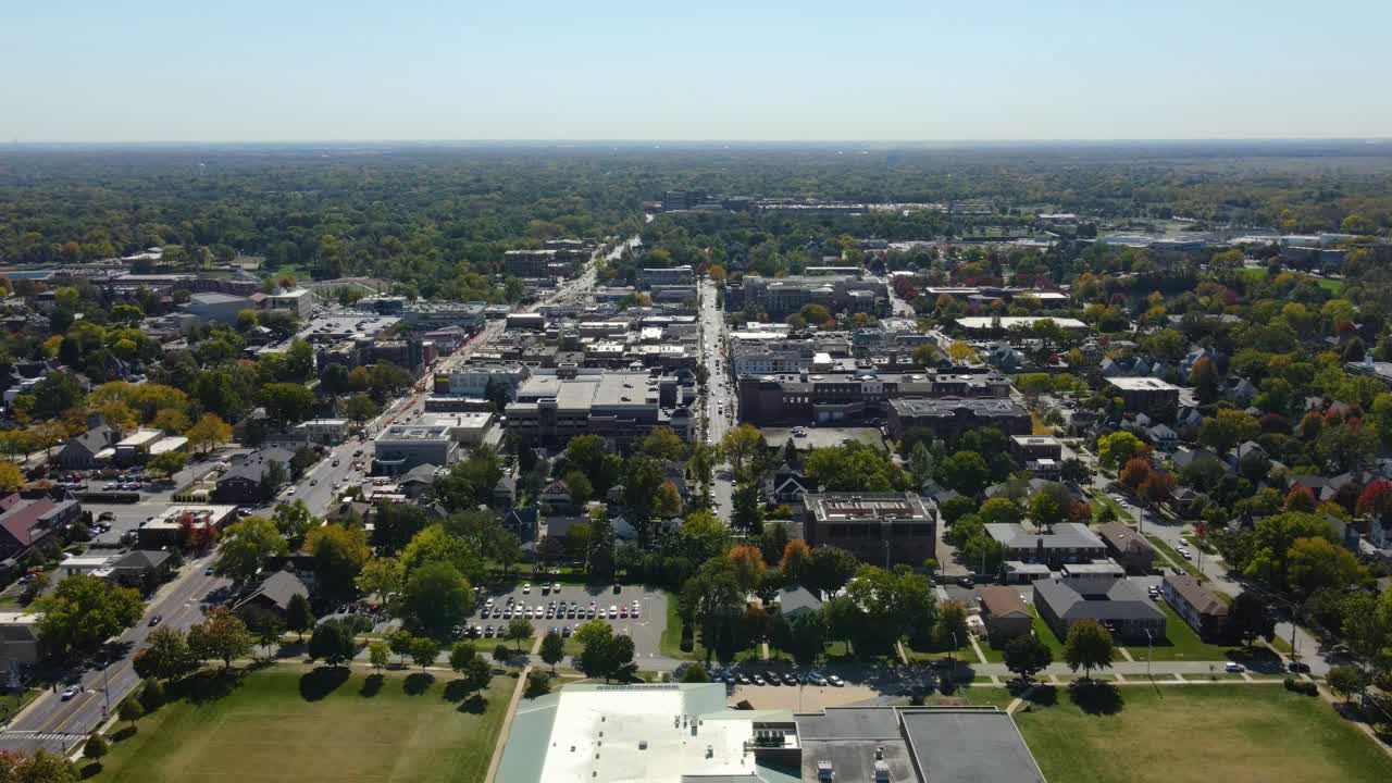 Naperville, IL, a Chicago suburb, on a sunny fall day, featuring buildings, streets. Crane Up Right Day S