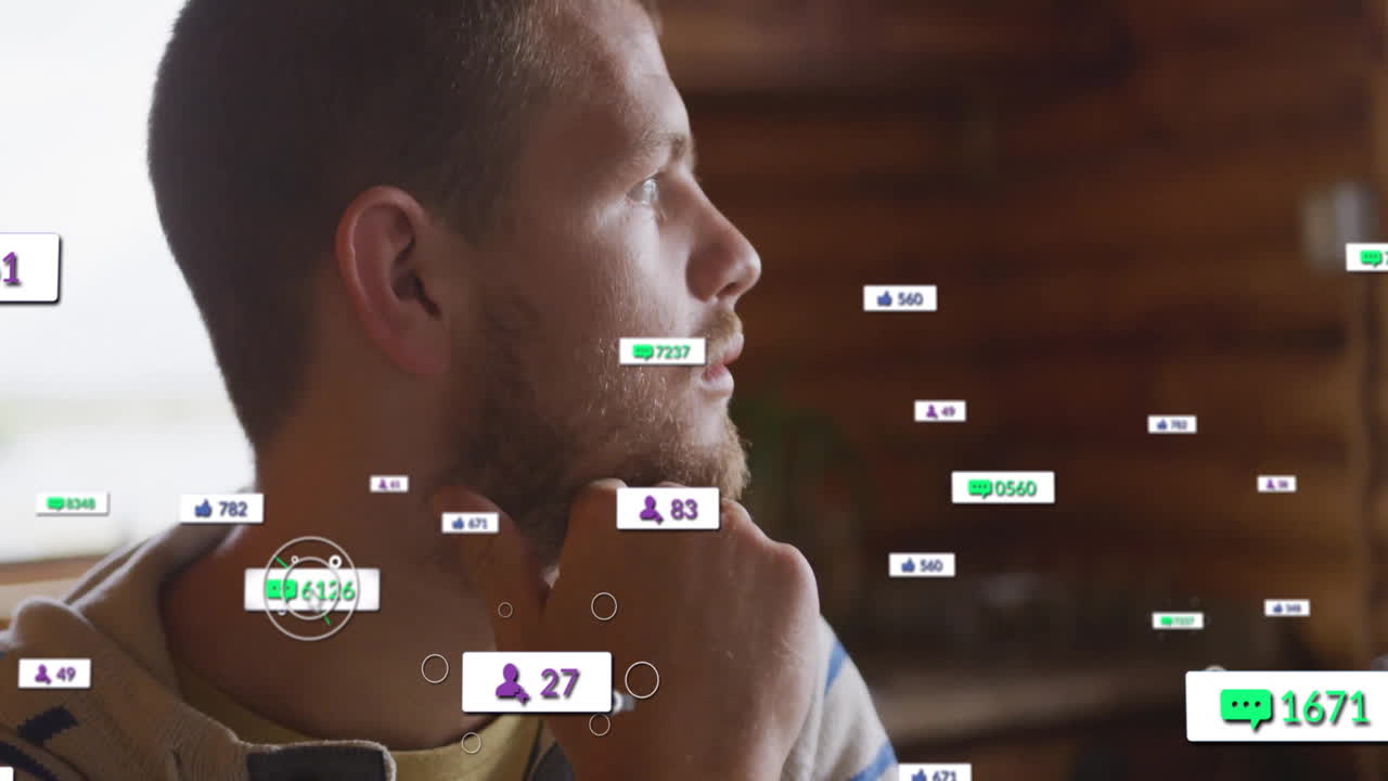 Man resting chin on hand indoors, displaying floating social media likes comments follower icons