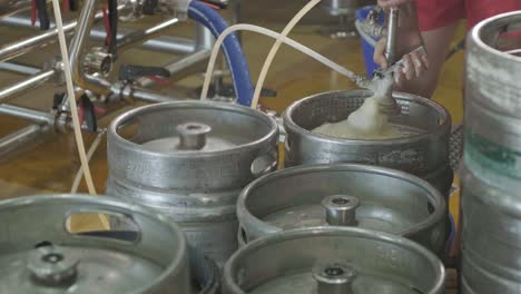 barrels of beer in a modern brewery