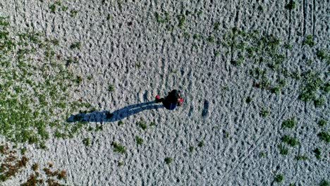 Drone-shot-of-young-attractive-black-female-doing-sports-outdoors