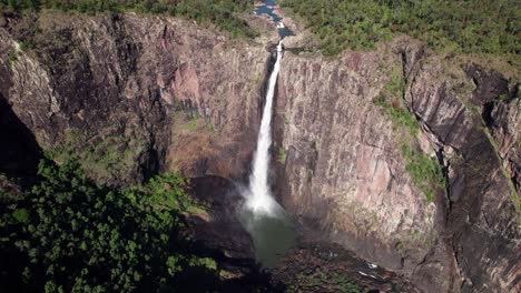 drone shot over the wallaman falls, the biggest waterfall in queensland, australia