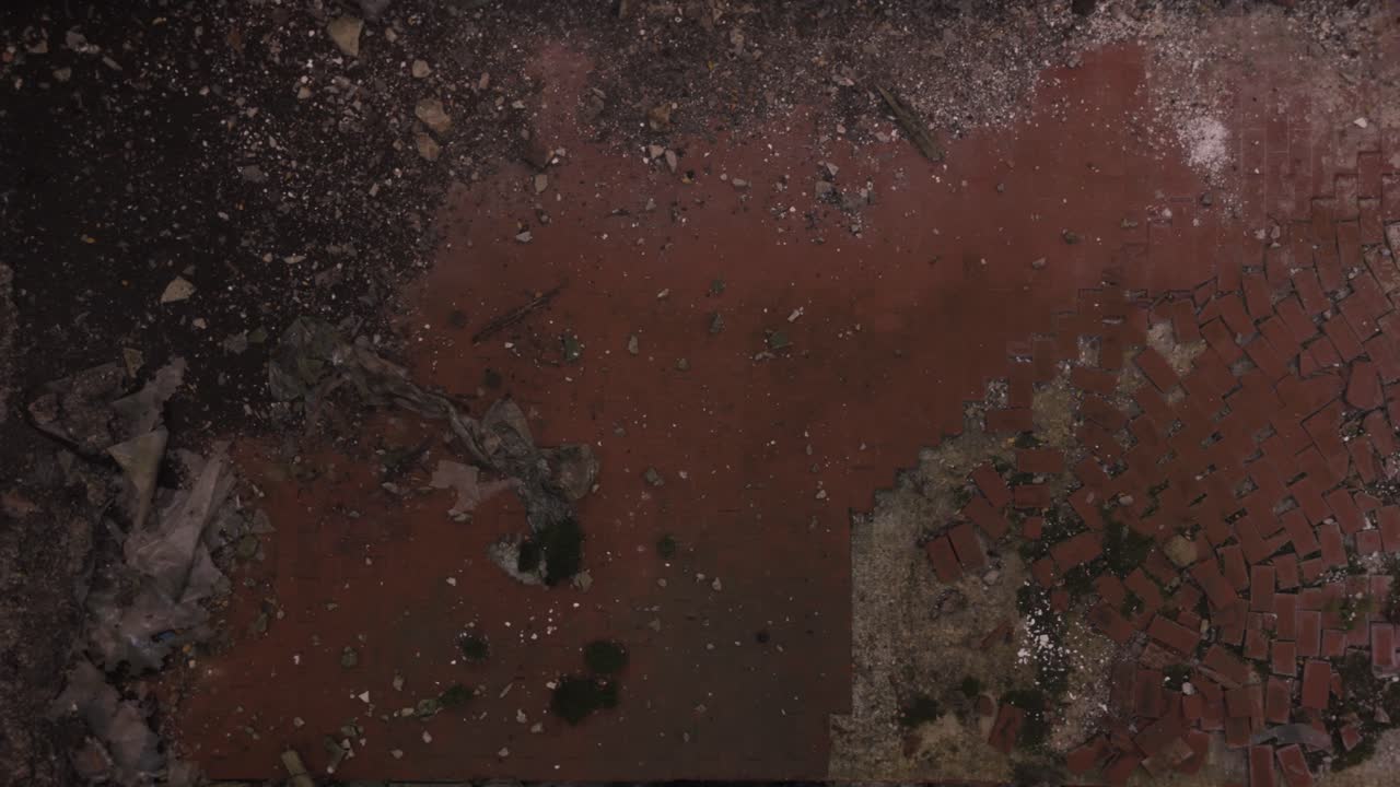 Abandoned and Decayed Brick Surface with Damage and Debris