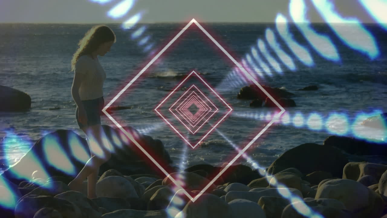 Walking on rocky beach, person with geometric animation overlay in background