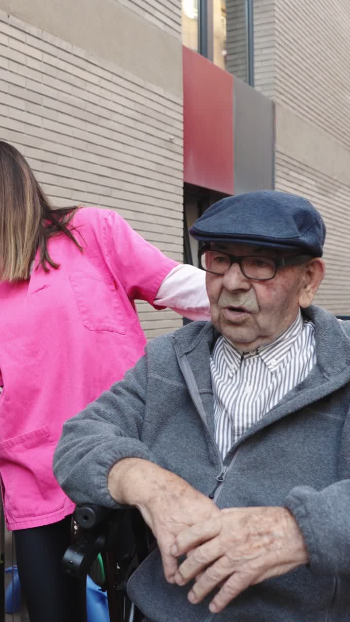 Elderly man with caregiver