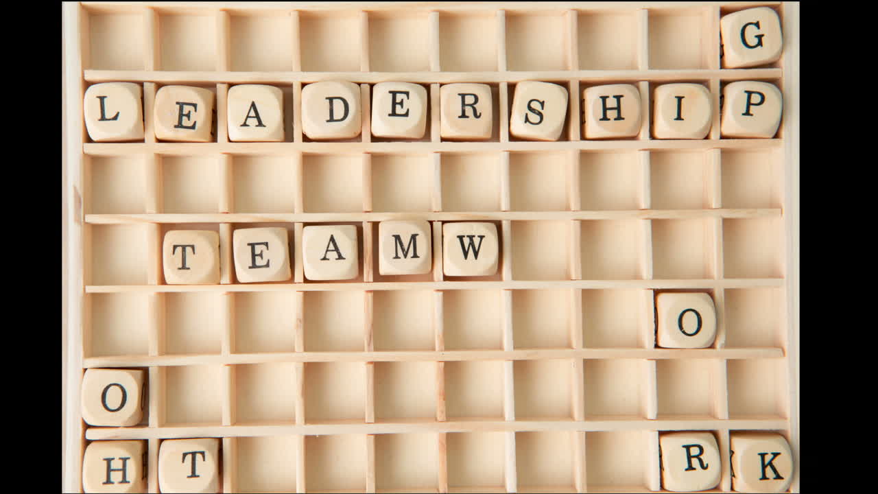 Business buzz words spelled out in dice and placed on grid