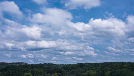 light breaking through cloud mass. beautiful sunny cloudscape. beautiful cloudscape, time lapse of clouds moving in sky and the sun shining through the clouds with rays. 4k loop