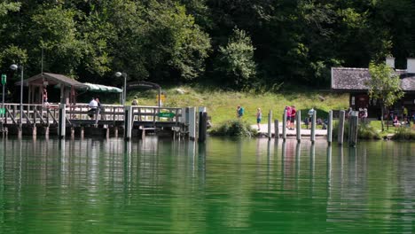 people waiting at salet landing stage at koenigssee berchdesgaden bavaria germany