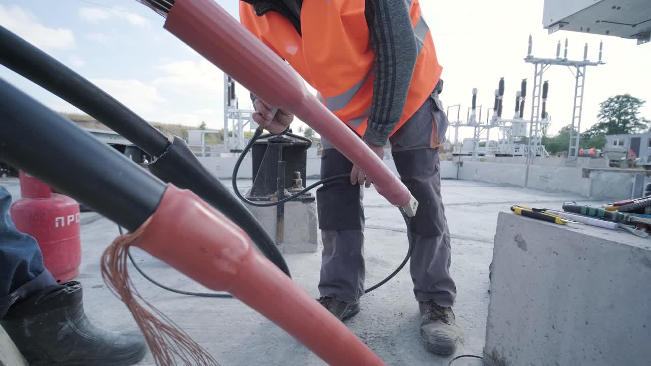 Power cable installation process at a transformer substation | Premium ...