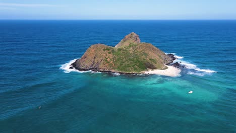 beautiful mokulua islands off oahu hawaii, aerial pullback