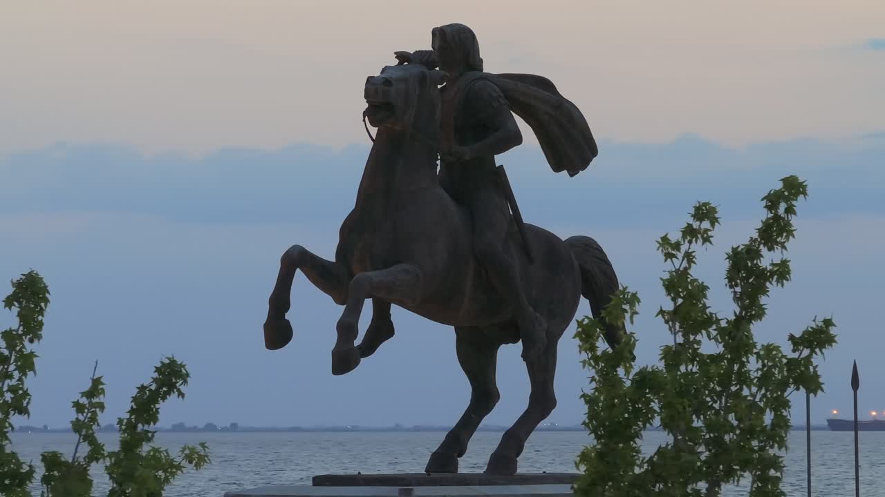 Alexander the Great statue in Thessaloniki behind trees