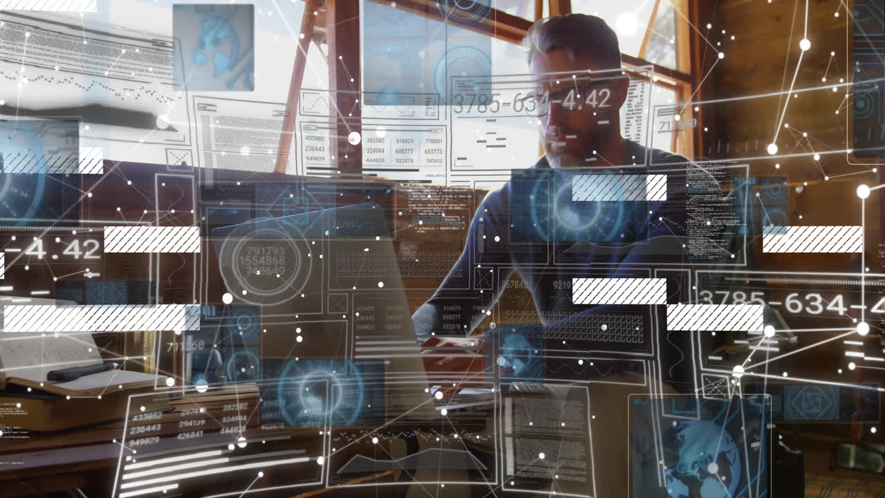 Working on laptop, man using animation technology interface in school setting