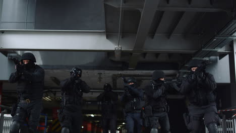 SWAT-team-members-exploring-building.-Soldiers-deploying-against-terrorism