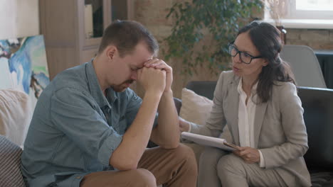 therapist supporting patient with depression