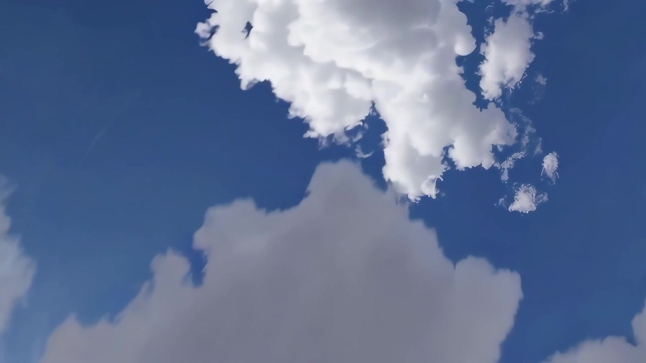 Time Lapse of White Clouds Moving Across a Bright Blue Sky