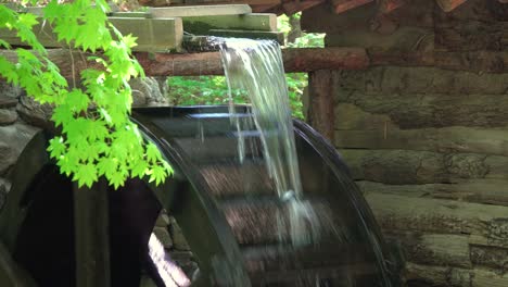 Big-Water-Wheel-In-A-Zen-Garden-At-A-Korean-Folk-Village---medium-shot