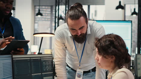 vertical video diverse employees team engaged in business planning and report writing