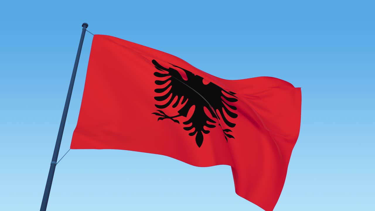 Albanian flag loop footage at day light blowing close up
