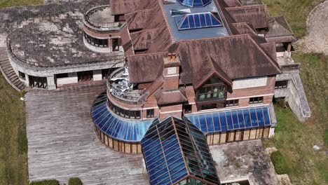 neglected luxurious millionaire property aerial view circling rundown private residence rooftop